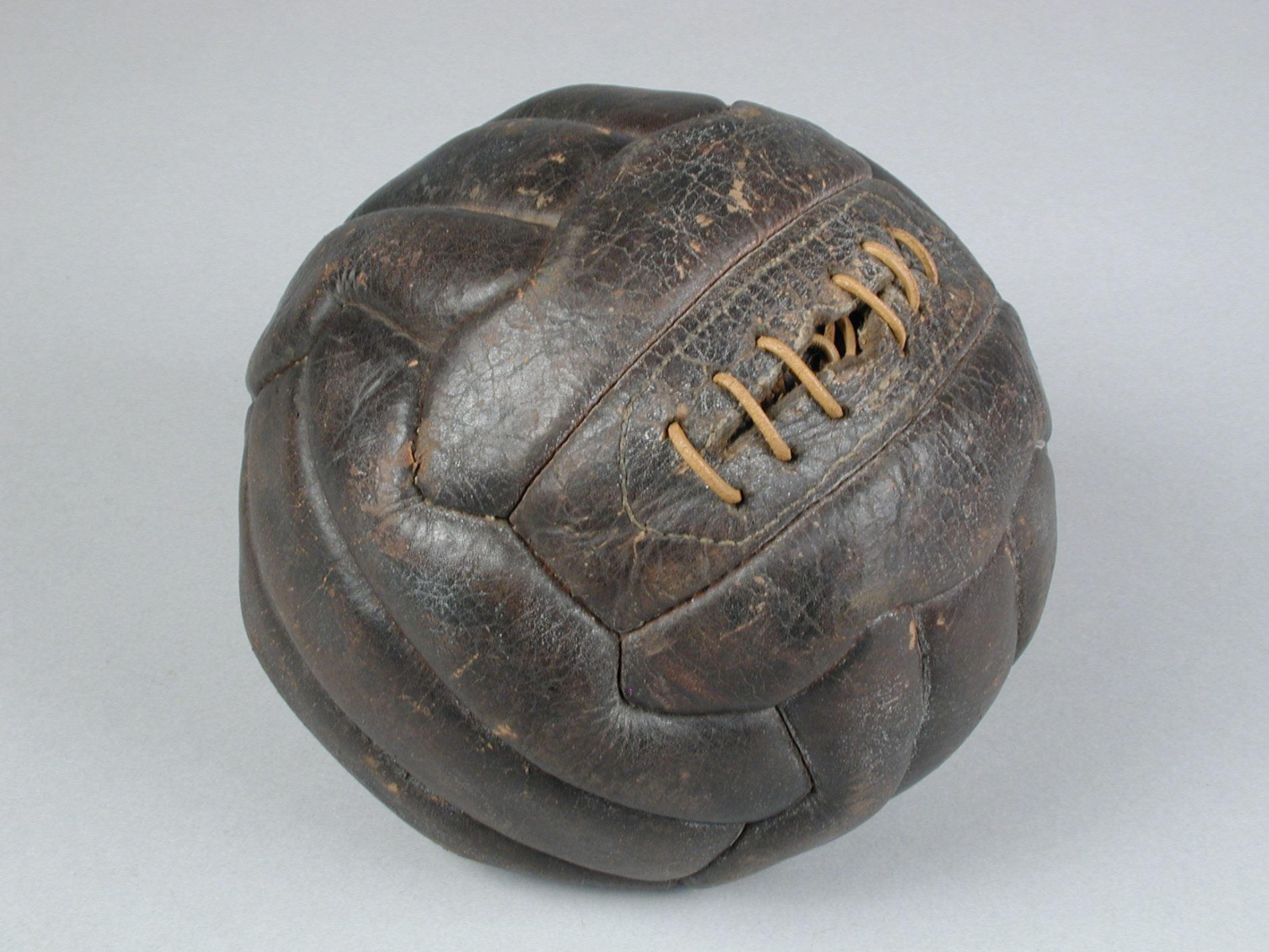 Vintage leather football, sporting memorabilia valuation